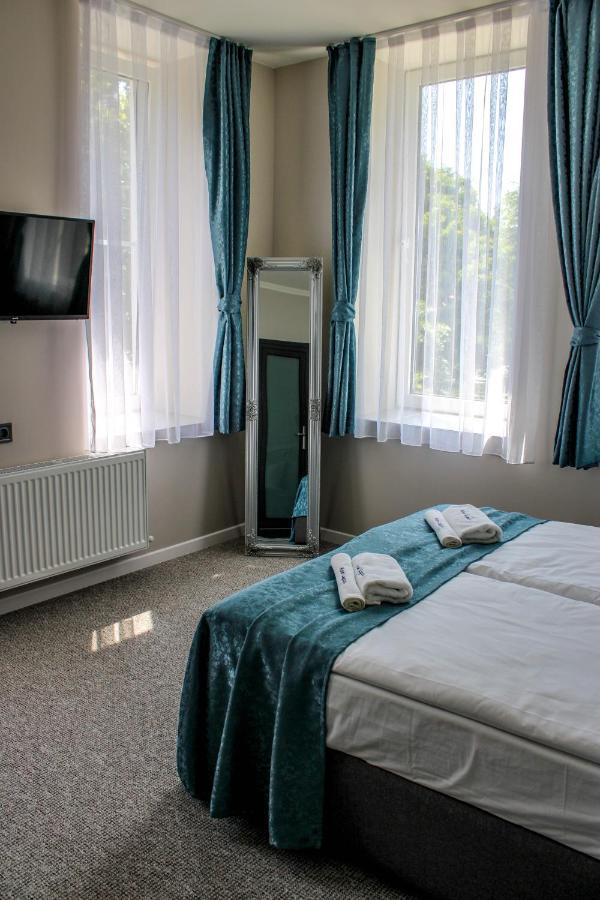 Hotel Laguna Terrace Kavarna Bagian luar foto