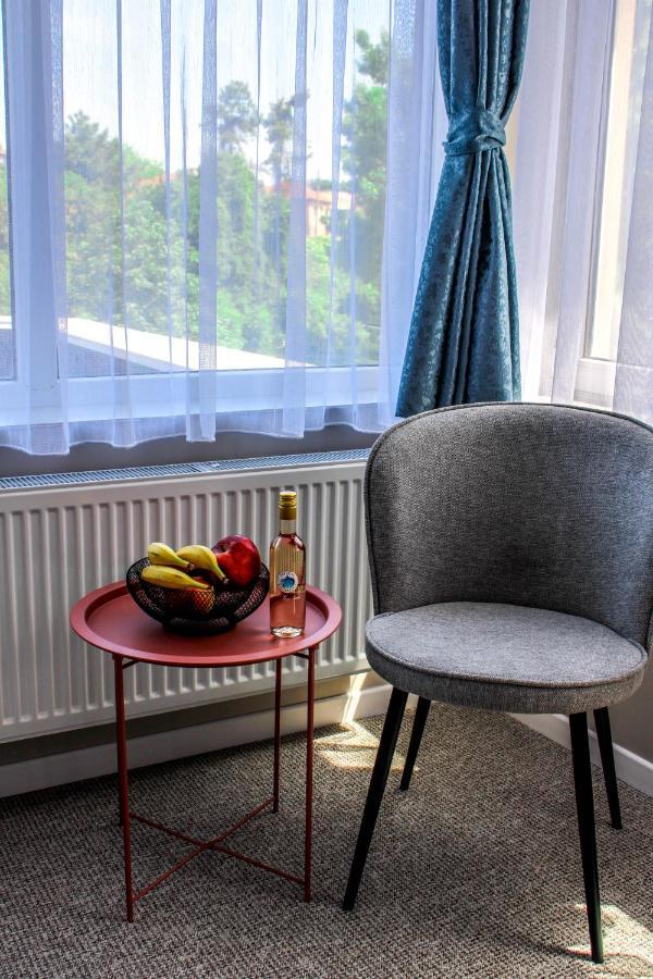 Hotel Laguna Terrace Kavarna Bagian luar foto