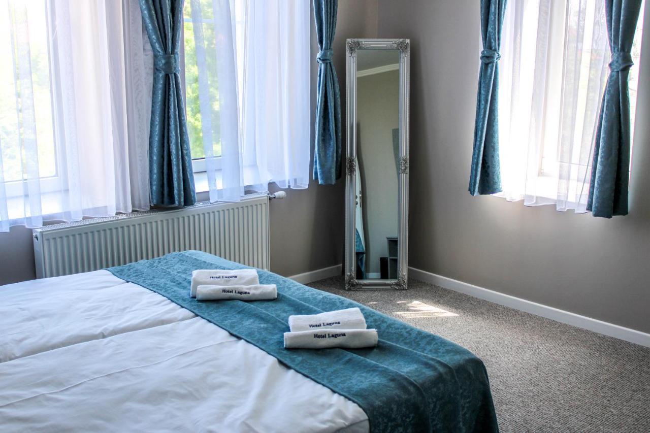 Hotel Laguna Terrace Kavarna Bagian luar foto